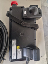 Load image into Gallery viewer, Second Hand > ABB TPU2 teach pendant included with the IRB 640 M2000 provides precise manual control, easy robot programming, and real‑time operation monitoring. This ergonomic teach pendant features a clear display, intuitive navigation keys, and dedicated safety controls, making it ideal for configuring high‑payload automation tasks. The TPU2 is fully compatible with the S4C+ controller, offering reliable performance for material handling, machine tending, spot welding, and palletizing applications.
