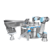 Load image into Gallery viewer, Le système FlexiBowl est un distributeur de pièces rotatif, circulaire, et adaptable, conçu pour les opérations d'alimentation de pièces en vrac. Il offre une grande flexibilité et peut être intégré à divers systèmes de vision. Le FlexiBowl d’Ars Automation se différencie des systèmes vibrants linéaires classiques en offrant une installation de production rapide et facile.

